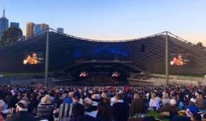 Emily Sun performing at the Sidney Myer Bowl with Melbourne Symphony Orchestra, conducted by Tianyi Lu.
